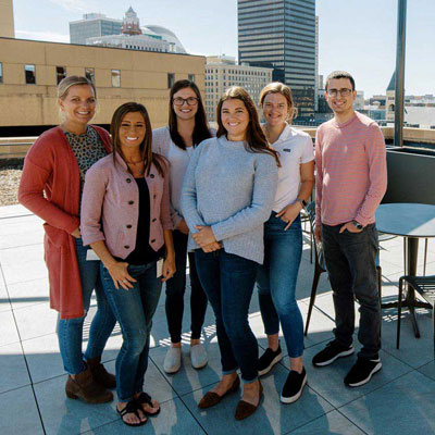 a group of young individuals posing for a picture