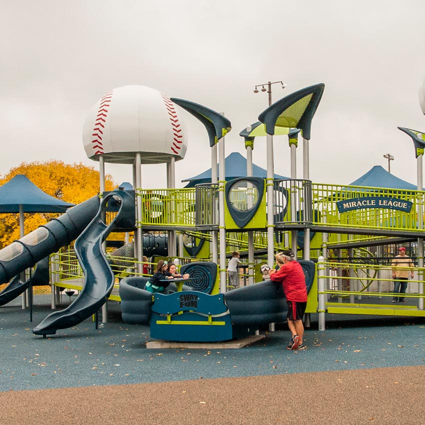 A group of children playing on a playground.
