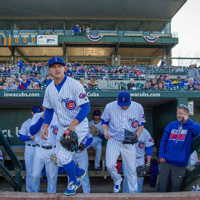Iowa Cubs baseball players in the dugout