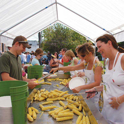 people getting sweet corn