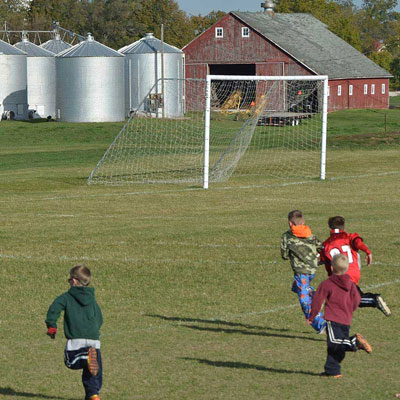 children playing soccer