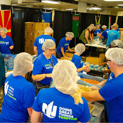 volunteer group packing food