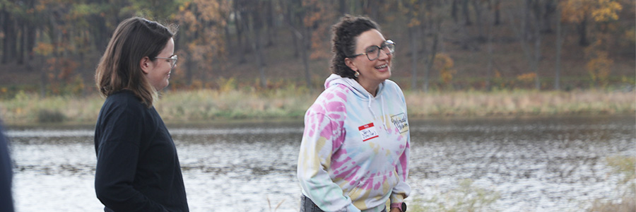 Wander Women Two women talking outside