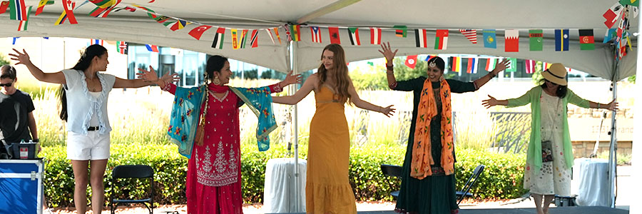 A group of women dancing on stage